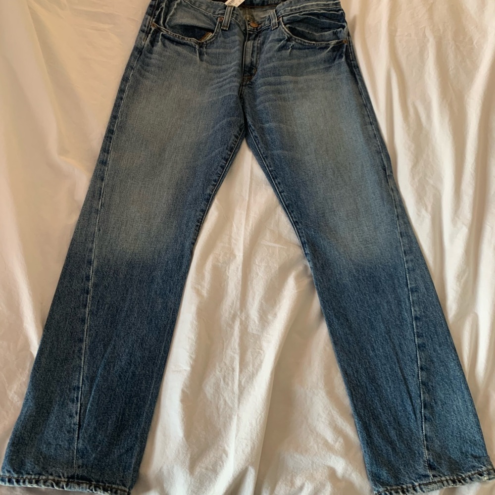 Broken in boyfriend medium wash mid rise denim